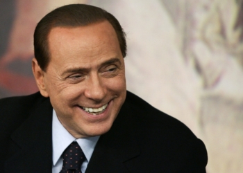 Italian Premier Silvio Berlusconi smiles during a press conference at Chigi Premier's palace, in Rome, Wednesday, Feb. 16, 2011. Berlusconi says he is not worried by an impending prostitution trial, in his first public comments since he was indicted. The 74-year-old Italian leader was ordered Tuesday to stand trial on charges he paid a 17-year-old Moroccan girl for sex, and then used his influence to cover it up. (AP Photo/Riccardo De Luca)