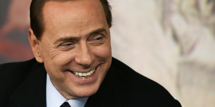 Italian Premier Silvio Berlusconi smiles during a press conference at Chigi Premier's palace, in Rome, Wednesday, Feb. 16, 2011. Berlusconi says he is not worried by an impending prostitution trial, in his first public comments since he was indicted. The 74-year-old Italian leader was ordered Tuesday to stand trial on charges he paid a 17-year-old Moroccan girl for sex, and then used his influence to cover it up. (AP Photo/Riccardo De Luca)