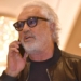 Flavio Briatore parla al telefono in occasione della consegna del premio giornalistico "E' giornalismo", Milano, 3 aprile 2019. ANSA/DANIEL DAL ZENNARO