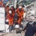 epa07058086 A handout photo made available by the Indonesian National Search and Rescue Agency (BASARNAS) shows rescuers moving bodies of the victims after a 7.7 magnitude earthquake and tsunami in Palu, Central Sulawesi, Indonesia, 30 September 2018. According to reports, at least 384 people have died as a result of a series of powerful earthquakes that hit central Sulawesi and triggered a tsunami.  EPA/BASARNAS HANDOUT BEST QUALITY AVAILABLE HANDOUT EDITORIAL USE ONLY/NO SALES