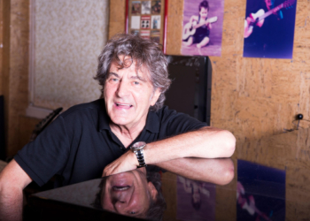 The singer Fausto Leali resting on the piano. Milan, Italy. 28th July 2016 (Photo by Marco PiracciniArchivio Marco PiracciniMondadori Portfolio via Getty Images)