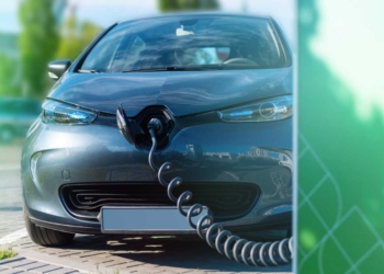 Plugged in charger into an electric car at charge station